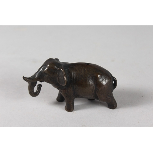 32 - A JAPANESE MEIJI PERIOD BRONZE ELEPHANT WATER DROPPER, 9cm long.