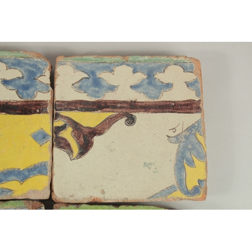 324 - A COLLECTION OF FOUR 18TH CENTURY PERSIAN CUERA SECA POTTERY TILES, (4).