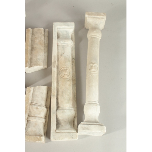 327 - A COLLECTION OF SEVEN ISLAMIC MAMLUK STYLE CARVED MARBLE PILLARS, some with Mamluk cup symbols, (7).