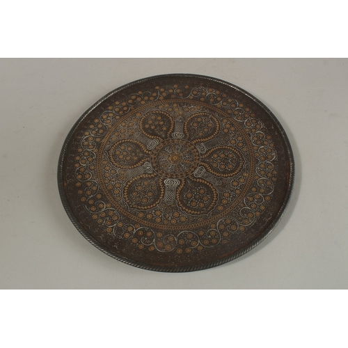 348 - A VERY FINE 19TH CENTURY INDIAN SILVER AND GOLD INLAID KOFTGARI STEEL DISH, 25.5cm diameter.