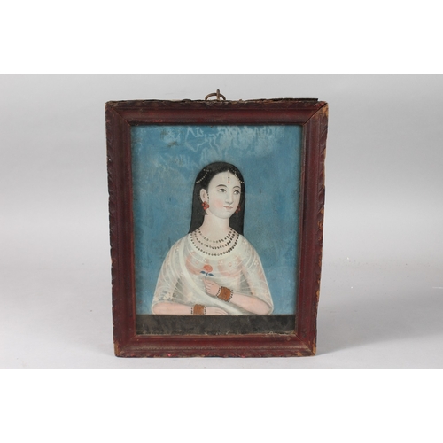 36 - A FINE INDIAN PORTRAIT PAINTING, possibly on mica, framed and glazed, 30.5cm x 24.5cm overall.