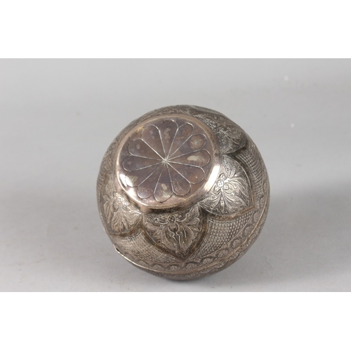 37 - A BRUNEI BORNEO MALAY ENGRAVED SILVER APPLE SHAPED LIDDED BOX, signed to stalk, 14cm high, 12cm wide... 