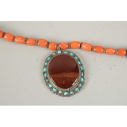 375 - A VERY FINE BUKHARA CORAL BEADED SILVER NECKLACE WITH AGATE PENDANT, adorned with turquoise beads, p... 