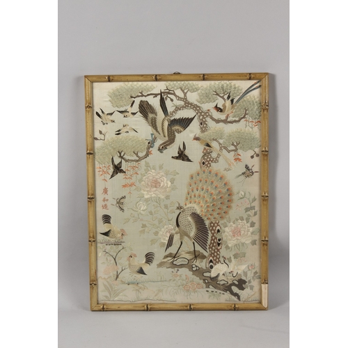 391 - A FINE 18TH-19TH CENTURY CHINESE EMBROIDERED SILK PICTURE, with a central peacock and other various ... 