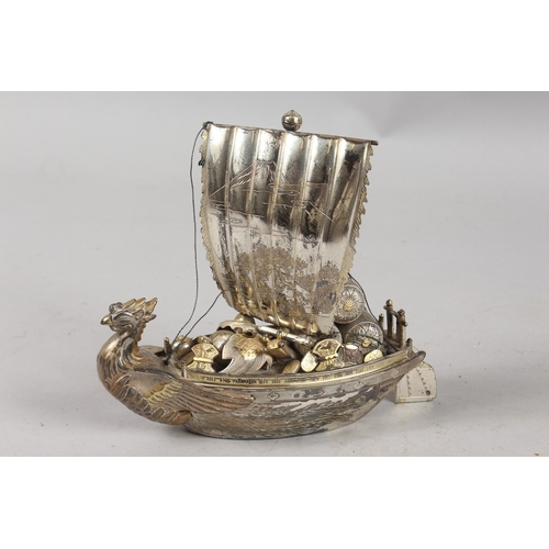 393 - A JAPANESE SILVER MODEL OF A BOAT, 15.5cm high.