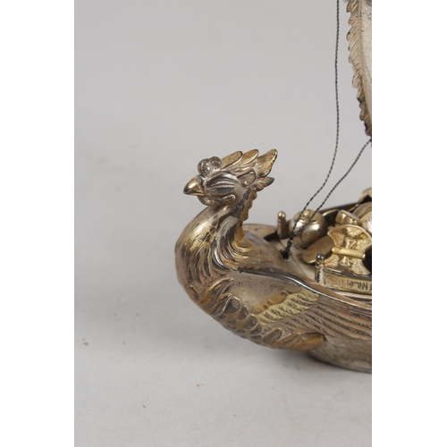 393 - A JAPANESE SILVER MODEL OF A BOAT, 15.5cm high.