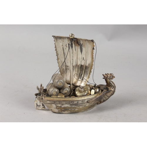 393 - A JAPANESE SILVER MODEL OF A BOAT, 15.5cm high.