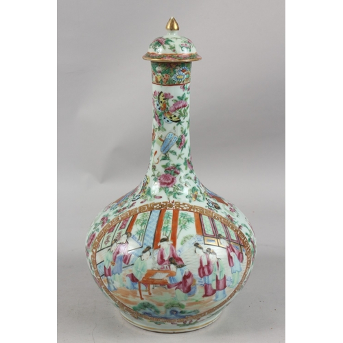 395 - A CHINESE CANTON FAMILLE ROSE PORCELAIN LIDDED VASE, painted with panels of figures as well as preci... 