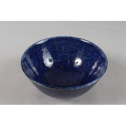 403 - A CHINESE MOTTLED BLUE GLAZE PORCELAIN BOWL, with faint dragon design to exterior, base with six-cha... 