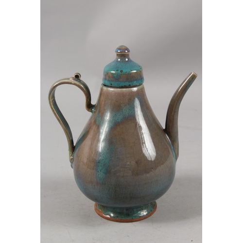 411 - A CHINESE 'ROBIN'S EGG' GLAZE POTTERY TEAPOT, 22cm high.