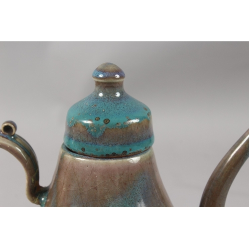 411 - A CHINESE 'ROBIN'S EGG' GLAZE POTTERY TEAPOT, 22cm high.