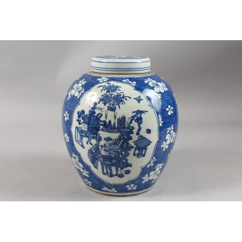 414 - A CHINESE REPUBLIC BLUE AND WHITE PORCELAIN GINGER JAR AND COVER, painted with two panels depicting ... 