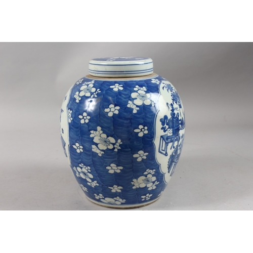 414 - A CHINESE REPUBLIC BLUE AND WHITE PORCELAIN GINGER JAR AND COVER, painted with two panels depicting ... 