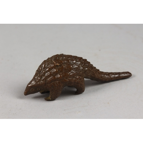 423 - A BRONZE OKIMONO OF A PANGOLIN.