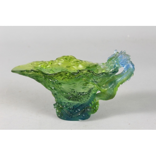 43 - A LIULI GONG FANG GLASS DRAGON CUP, inscribed to the base, serial no. 1067/1200, 17cm long.