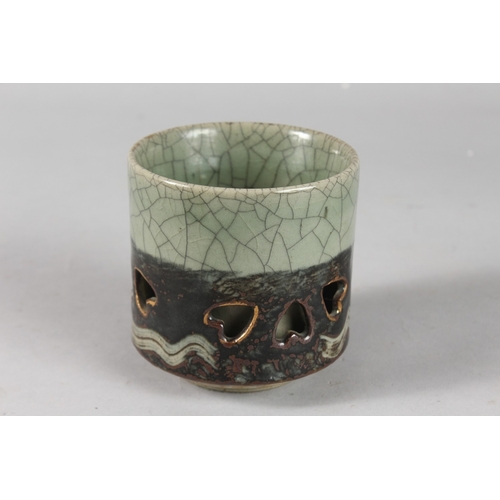 7 - AN UNUSUAL JAPANESE CELADON CRACKLE GLAZE CENSER, 9.5cm high.