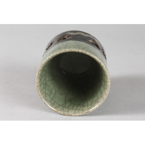 7 - AN UNUSUAL JAPANESE CELADON CRACKLE GLAZE CENSER, 9.5cm high.