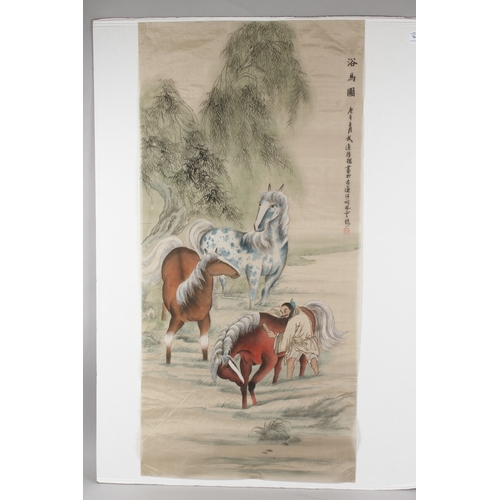 76 - A LARGE CHINESE PAINTING ON SILK, depicting horses being groomed, inscribed and bearing red seal mar... 