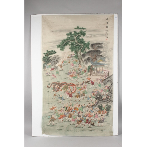 77 - A LARGE CHINESE PAINTING ON SILK, depicting one hundred boys at play, inscribed and bearing red seal... 