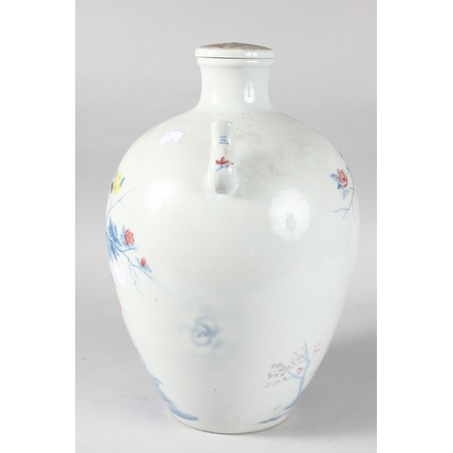 94 - A VERY LARGE CHINESE PORCELAIN LIDDED WINE POT, painted with flora, 38cm high.