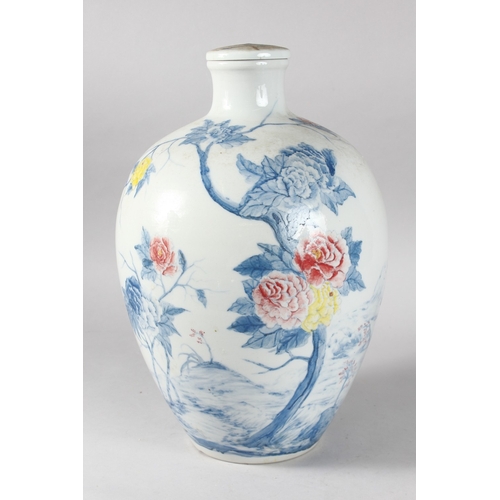 94 - A VERY LARGE CHINESE PORCELAIN LIDDED WINE POT, painted with flora, 38cm high.