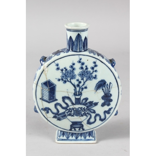 95 - AN 18TH-19TH CENTURY CHINESE BLUE AND WHITE PORCELAIN MOON FLASK, painted with a central vase of flo... 