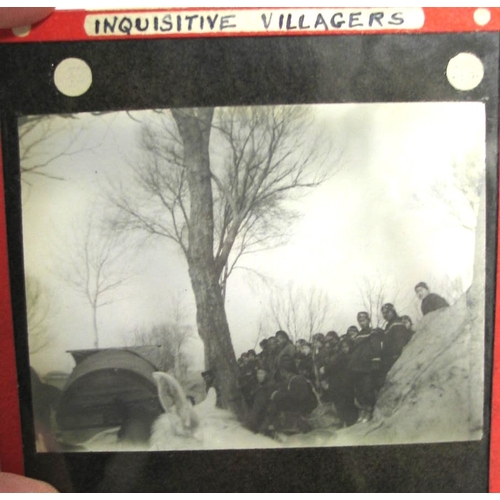 101 - CHINA, PHOTOGRAPHY.  Group of 37 glass lantern slides, circa 1920s, in red cloth box.