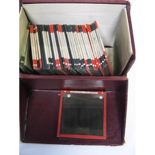 101 - CHINA, PHOTOGRAPHY.  Group of 37 glass lantern slides, circa 1920s, in red cloth box.