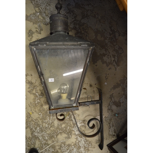 100 - A large copper external lantern with wall mounting bracket.