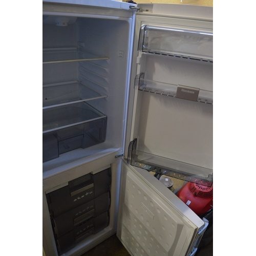 132 - A fridge freezer.