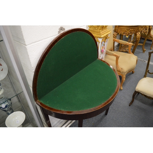 195 - A mahogany demi-lune fold-over card table.