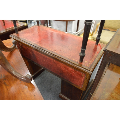 204 - A Victorian mahogany twin pedestal desk with leather inset writing surface and drop-flap extension.