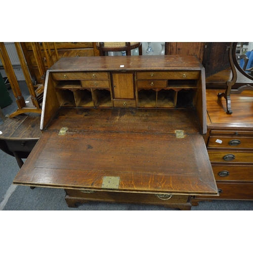 215 - A 19th century oak bureau.