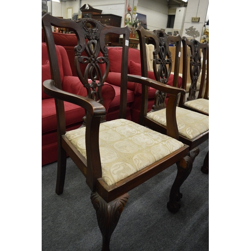 235 - A set of eight Chippendale style mahogany dining chairs, two with arms (faults).