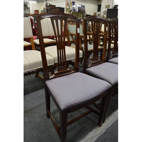 241 - A set of six mahogany dining chairs.