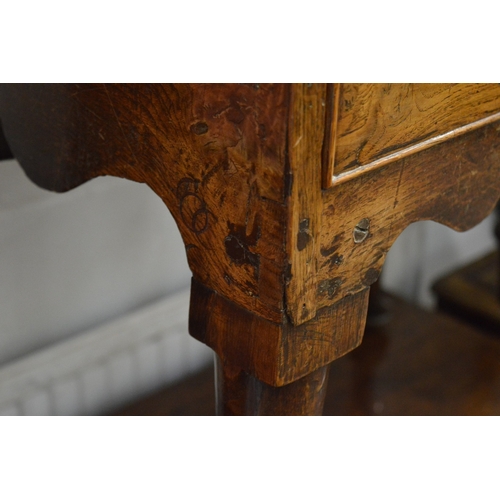 305 - An 18th century oak low boy (alterations and repairs).