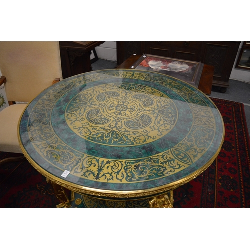 321 - A large and impressive faux malachite and ormolu circular centre table.