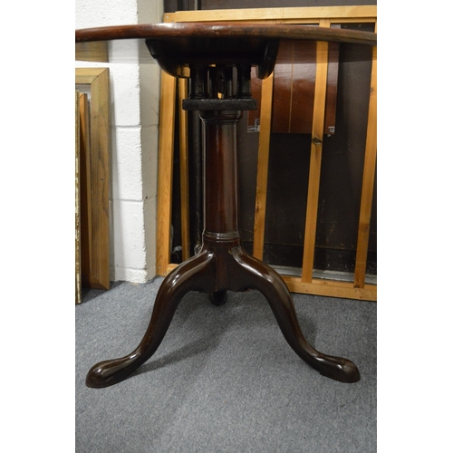 329 - A 19th century mahogany circular tilt-top tripod table.