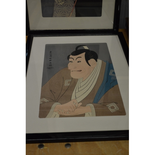 392 - Two Japanese woodblock prints of actors.