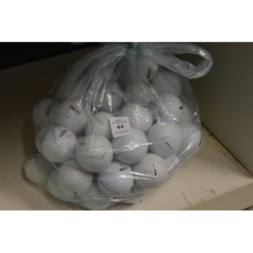 44 - A quantity of golf balls.