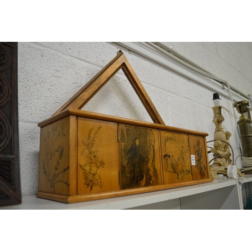 563 - A good satin wood hanging small cabinet, pen work decoration with allegorical tales.