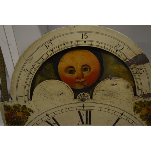 573 - A 19th century painted eight day clock dial with moon phase movement.