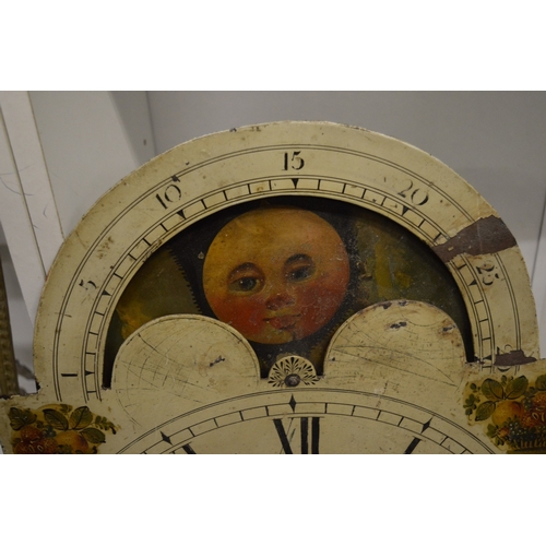 573 - A 19th century painted eight day clock dial with moon phase movement.