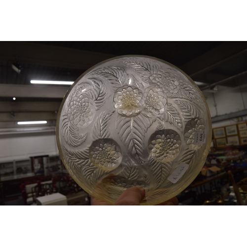 592 - A Lalique opaque glass circular bowl moulded with flowers (rim chip).