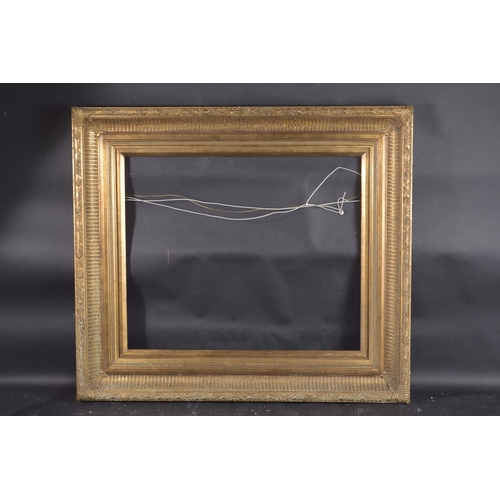 10 - A GILT PICTURE FRAME Rebate size 20 ins x 24ins.