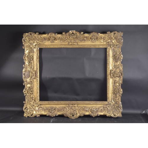 11 - A GOOD VICTORIAN GILT PICTURE FRAME Rebate size 21.5ins x 26.5ins.