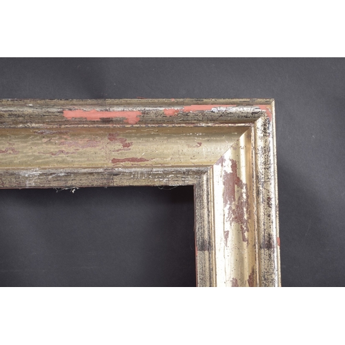 2 - A SILVERED GILT PICTURE FRAME Rebate size 11ins x 11ins.