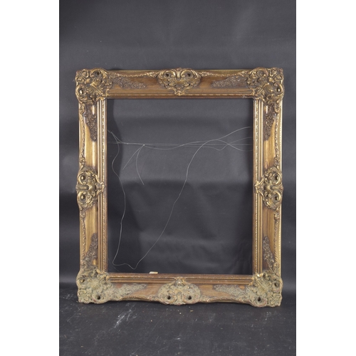 5 - A GILT PICTURE FRAME Rebate size 21.5ins x 11.75ins