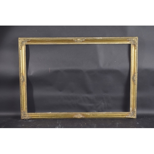 8 - A GILT PICTURE FRAME Rebate size 20ins x 30ins