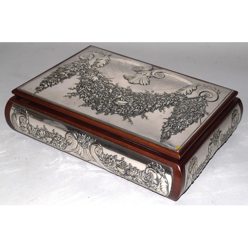 1171 - AN ITALIAN .921 SILVER BOX the wooden frame with embossed silver panels. 9.5in long x 7ins wide x 2.... 